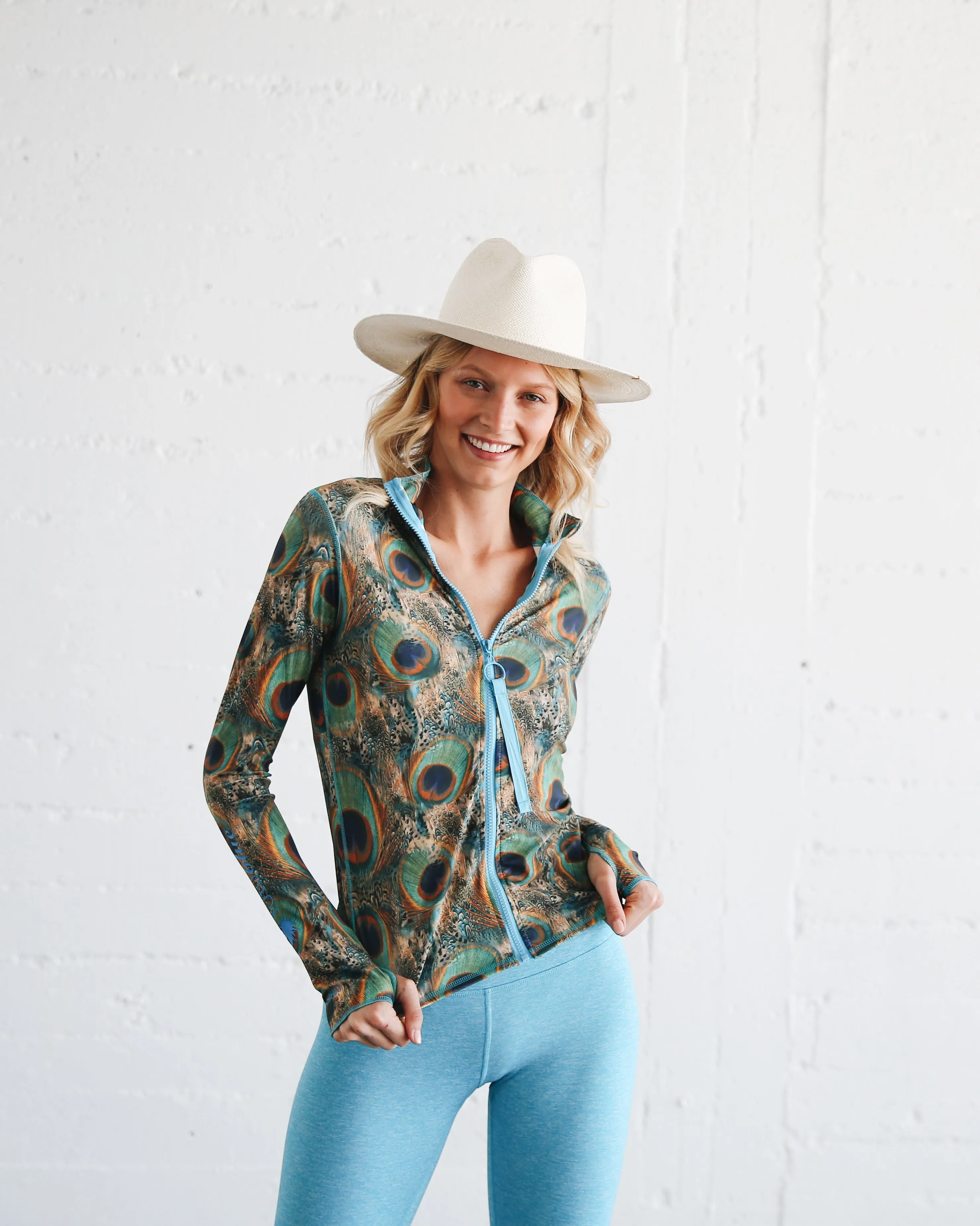 WOMEN'S ZIP RASH GUARD - PEACOCK